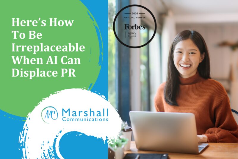 AI in public relations - Woman with a big smile using laptop