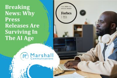 Breaking News: Why Press Releases Are Surviving In The AI Age - Man typing on keyboard with headphones around his neck