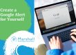 Google Alerts for personal branding - person typing on laptop with Google open