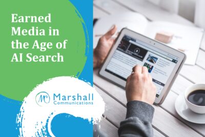 Earned Media in the Age of AI Search - person using tablet