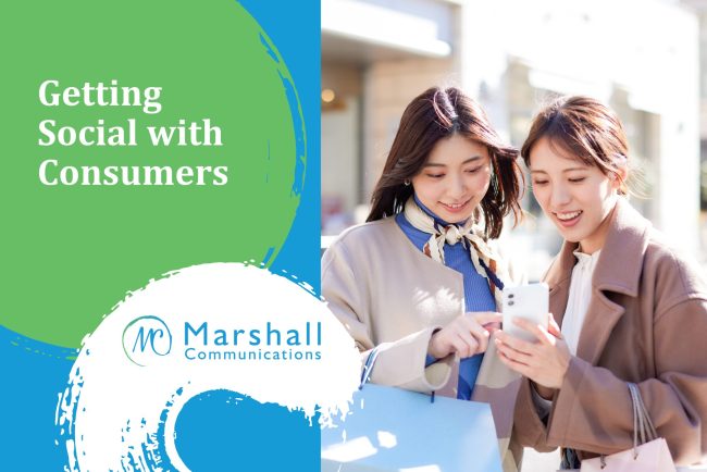 Getting Social with Consumers - two women looking at a phone