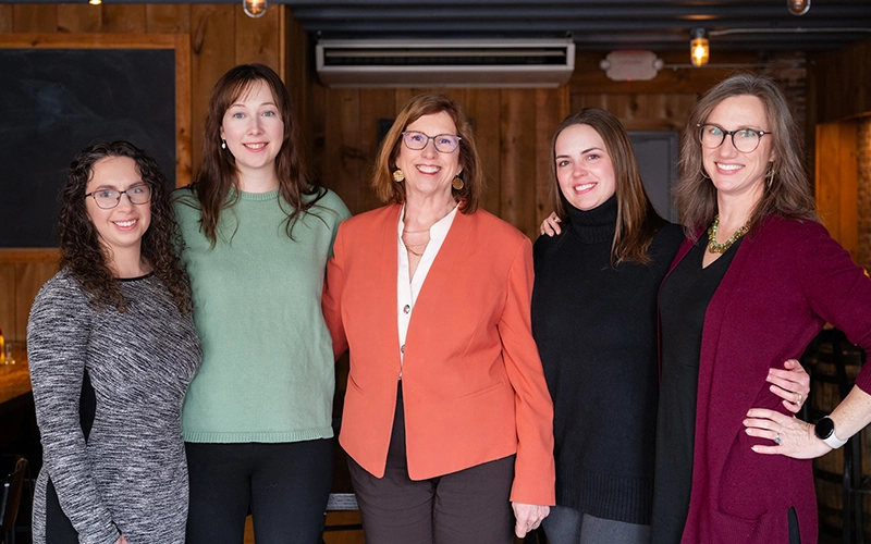 Nancy Marshall with her team