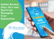 Person using a smartphone to submit a five-star online review with the text “Online Review Sites: Do’s and Don’ts for Managing Your Reputation” and Marshall Communications logo.