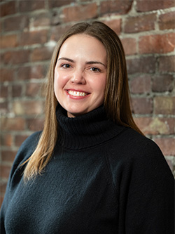 Headshot of Whitney Raymond